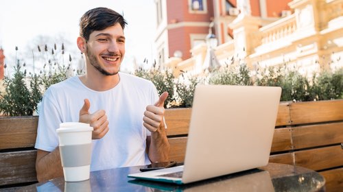 Guy attending online meeting